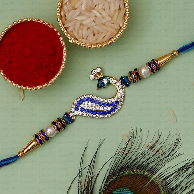 Dreamica Mens Rakhi Gift for Brother, Rakhi with Lord Ganesha Idol Combo Set | Best Rakhi for Brother | Pack of 8 (5 Rakhi, 1 Ganesh Idol, 1 Greeting Card, 1 Roli Chawal Pack,Gn-28)